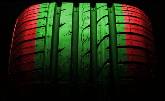 Tyre tread guide with the central tread area highlighted green as the potential repair area and the outer shoulder areas highlighted red